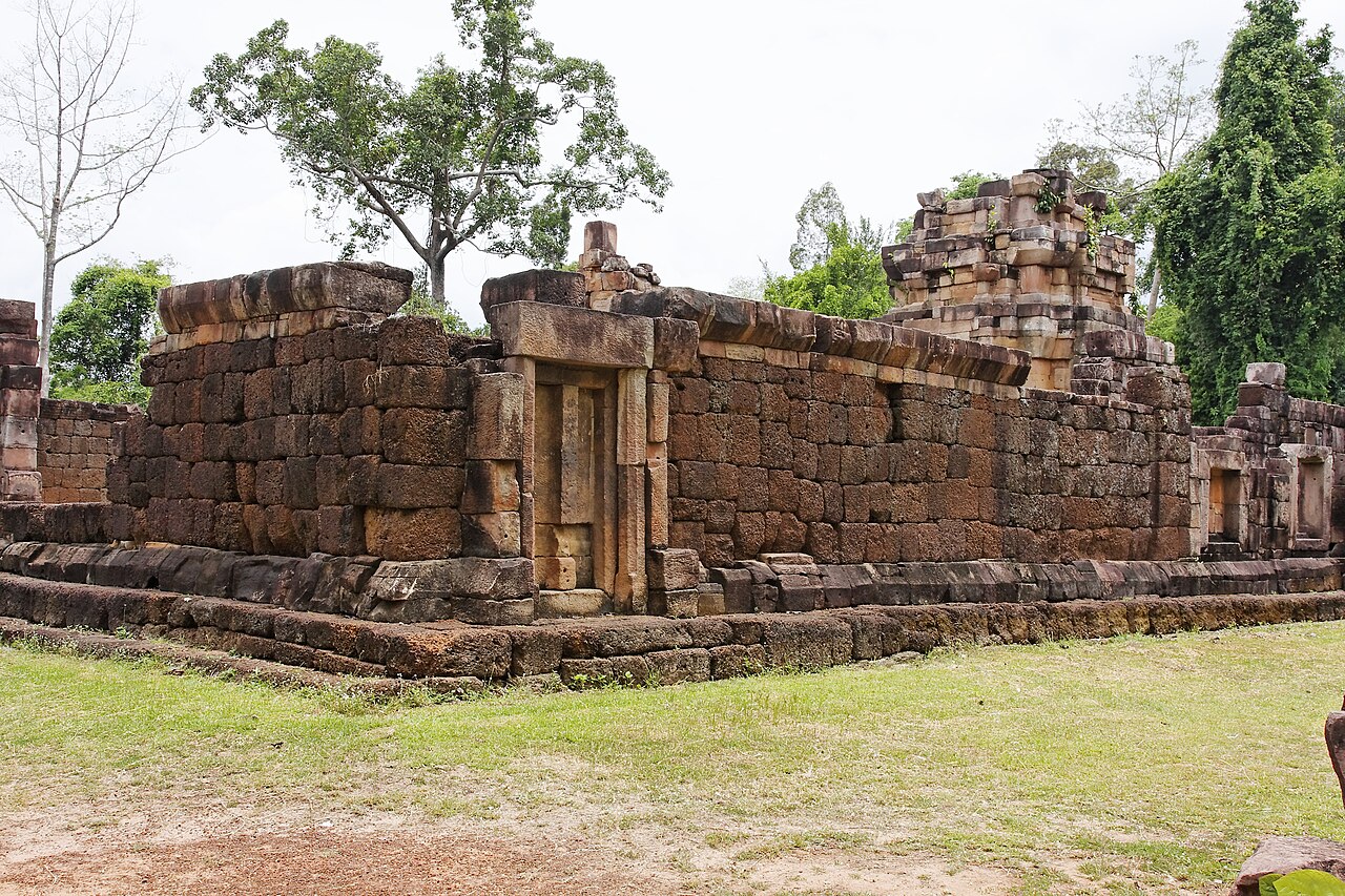 Stone walls, doorways and tower remains at Prasat Ta Muen Thom temple.